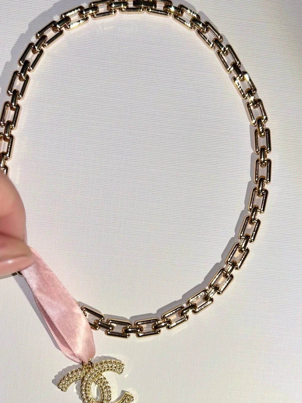 CHANEL Gold CC Pendant with Pink Ribbon New Elegant Chain